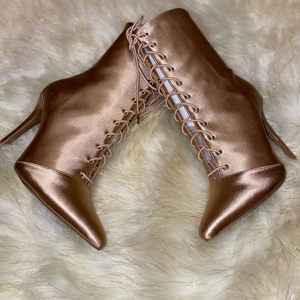 Champagne point to booties.